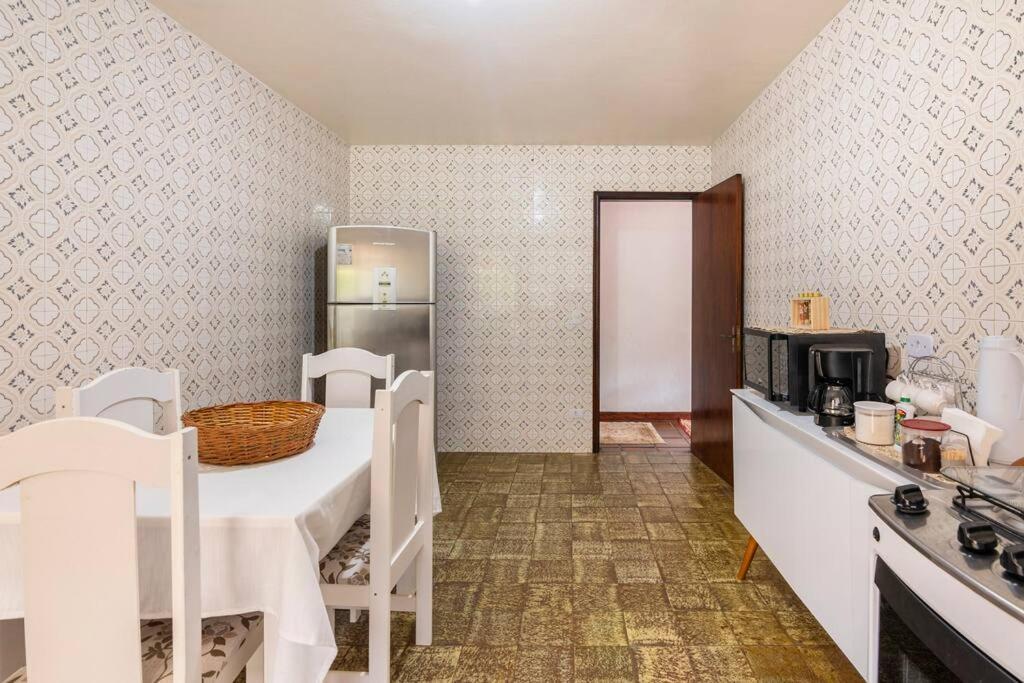 Aconchegante Casa Em