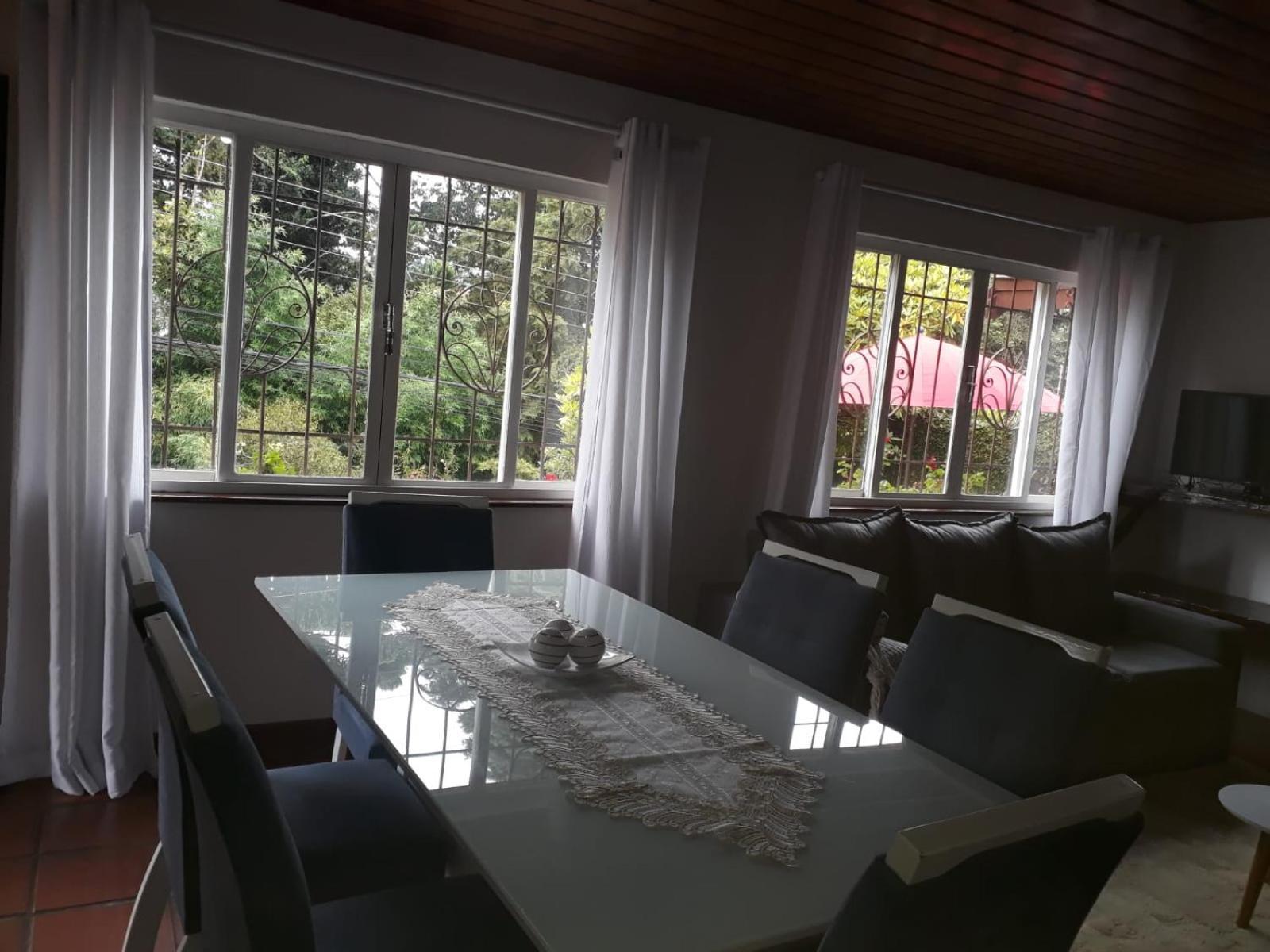 Aconchegante Casa Em